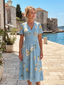 Marion | Floral Print Short Sleeve V Neck Midi Dress